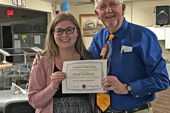 Robin Hebrock/Pahrump Valley Times Tiffini Thompson poses with Pahrump Lions Club member Bill N ...