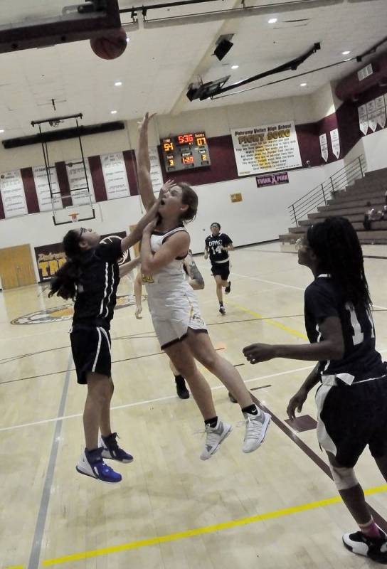 Horace Langford Jr./Pahrump Valley Times Junior guard Maddy Souza attacks the basket during Mon ...