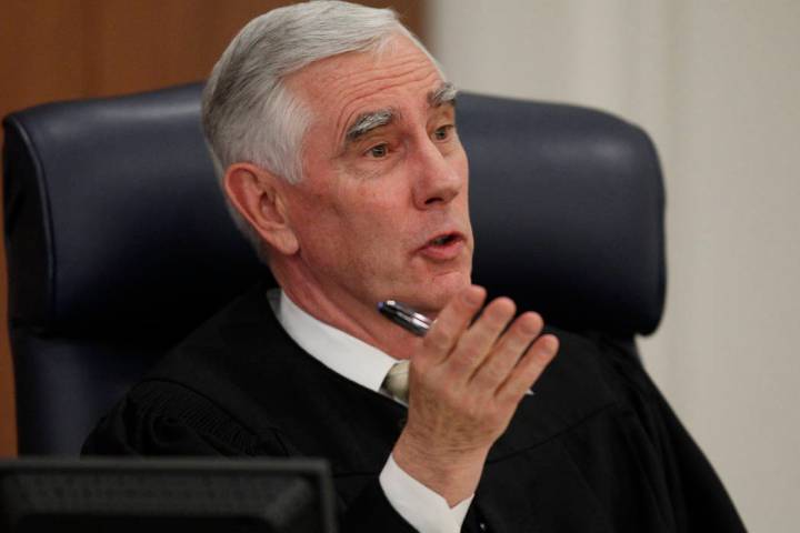 John Locher/Las Vegas Review--Journal District Judge James Todd Russell speaks in his court in ...