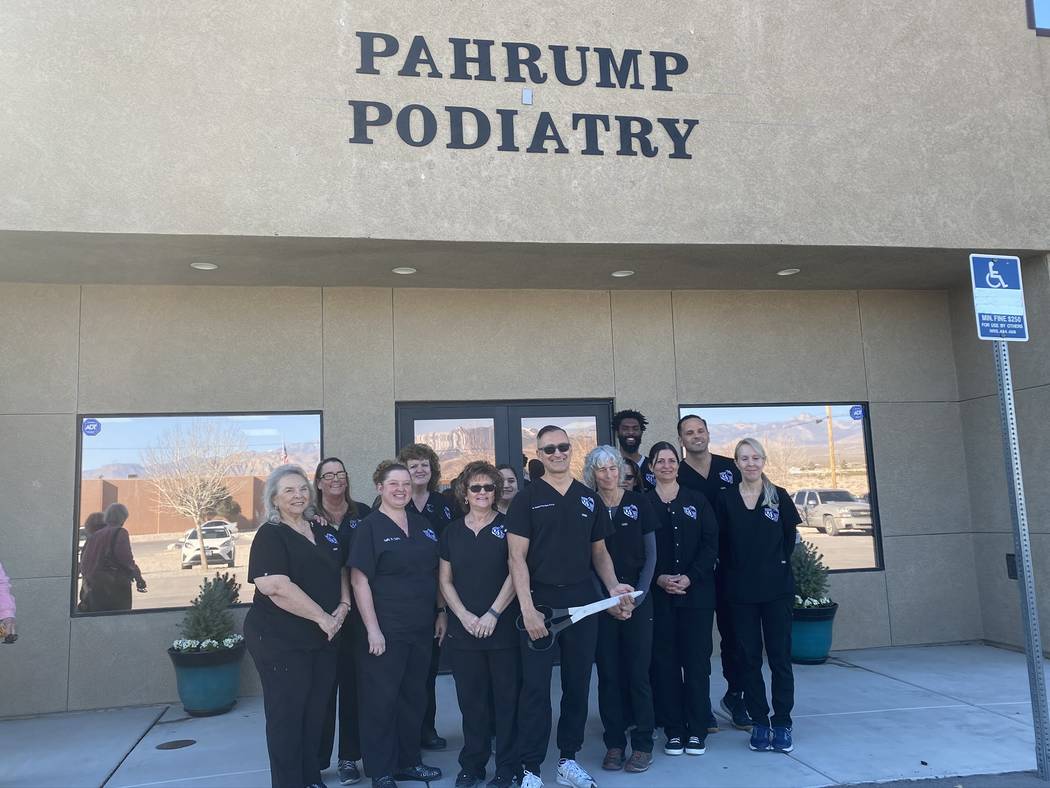 Jeffrey Meehan/Pahrump Valley Times The staff of Pahrump Podiatry stand in front of the company ...