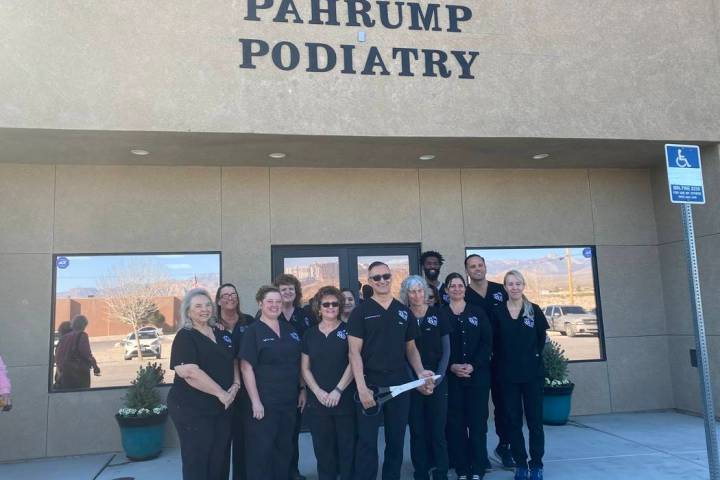 Jeffrey Meehan/Pahrump Valley Times The staff of Pahrump Podiatry stand in front of the company ...