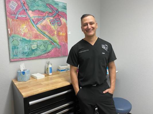 Jeffrey Meehan/Pahrump Valley Times Dr. Bobby Pourziaee of Pahrump Podiatry stands in an exam r ...