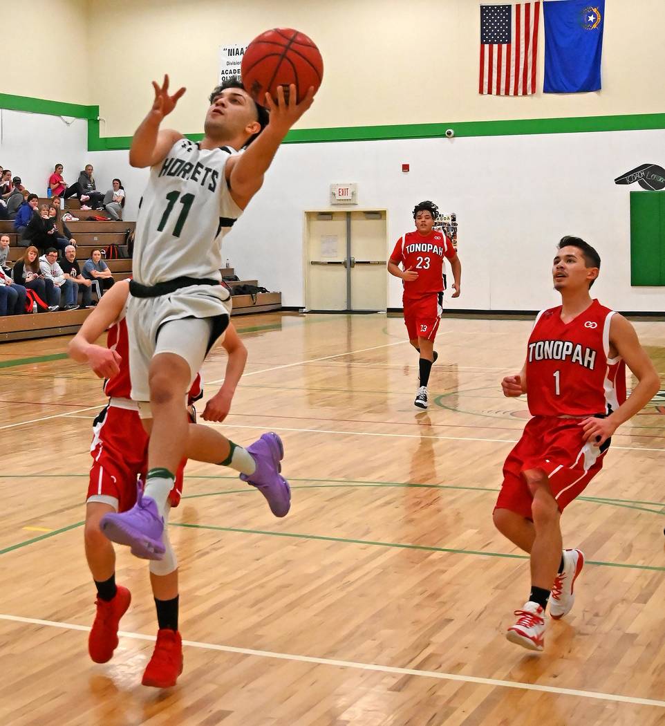 Richard Stephens/Special to the Pahrump Valley Times Beatty senior guard Fabian Perez drives to ...