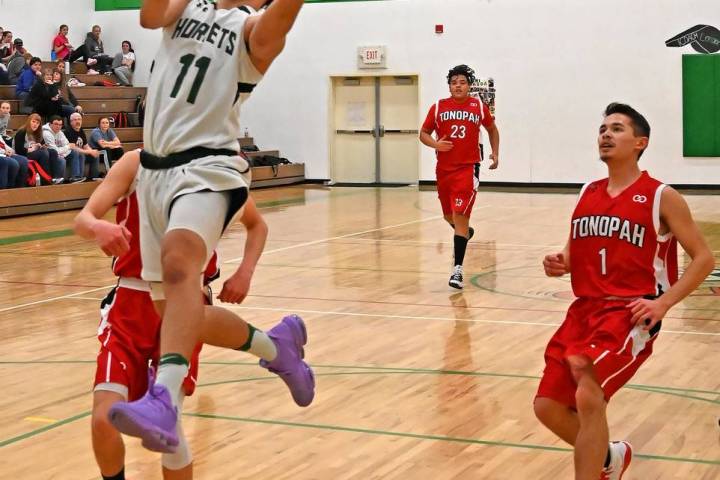 Richard Stephens/Special to the Pahrump Valley Times Beatty senior guard Fabian Perez drives to ...