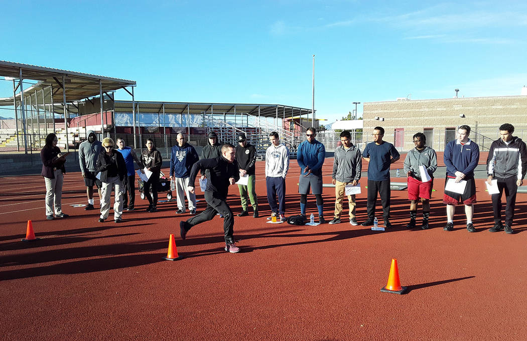 Selwyn Harris/Pahrump Valley Times Out of the two dozen candidates undertaking the fitness test ...