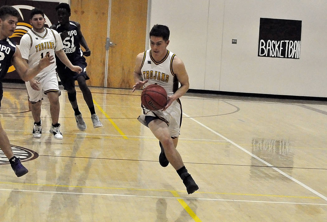 Horace Langford Jr./Pahrump Valley Times Pahrump Valley junior guard Andrew Avena pushes the ba ...