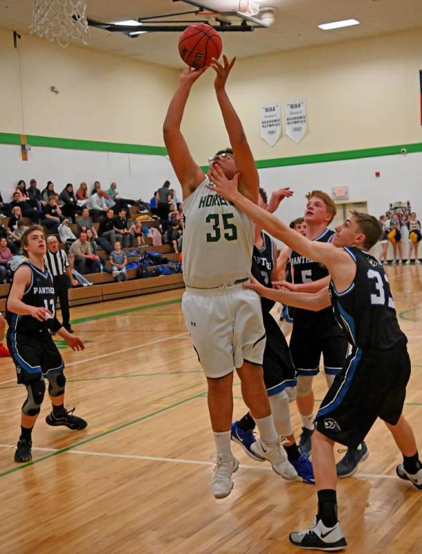 Richard Stephens/Special to the Pahrump Valley Times Juan Lopez makes a move toward the basket ...