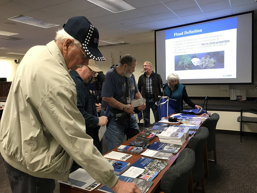 Robin Hebrock/Pahrump Valley Times As residents entered the Flood Insurance Rate Map workshop, ...