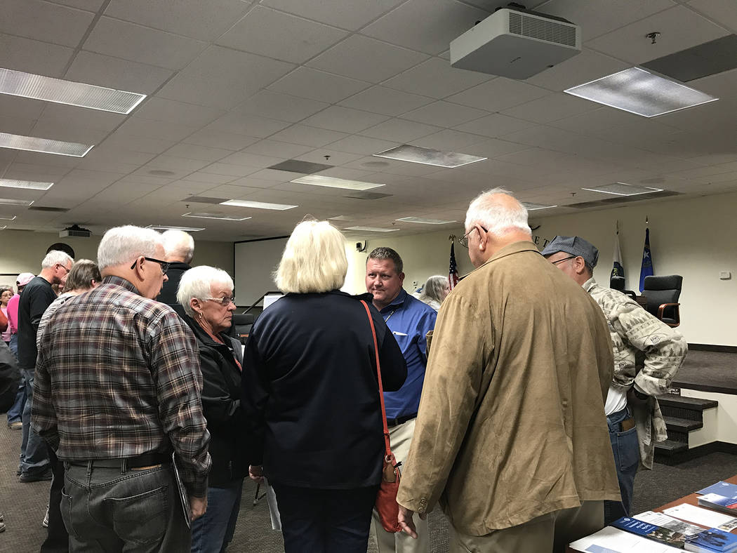 Robin Hebrock/Pahrump Valley Times Area residents are pictured speaking with Nye County Plannin ...