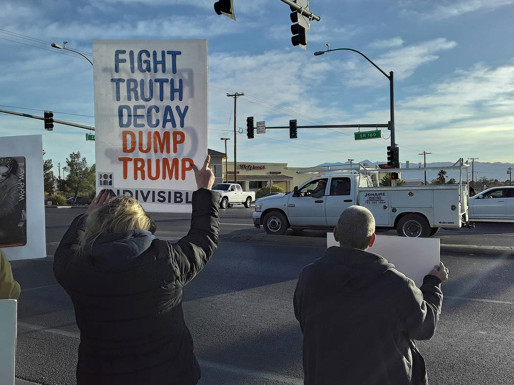 Selwyn Harris/Pahrump Valley Times A group of individuals opposed to President Donald Trump's i ...