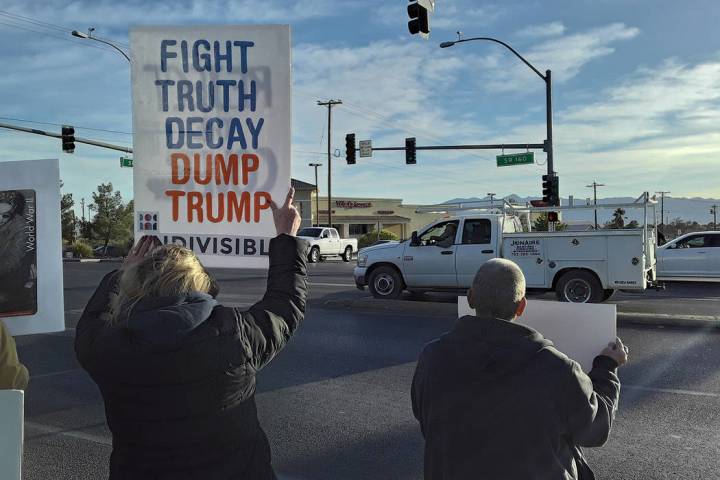 Selwyn Harris/Pahrump Valley Times A group of individuals opposed to President Donald Trump's i ...