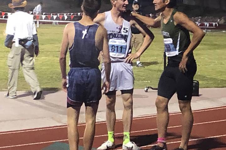 Tom Rysinski/Pahrump Valley Times Beatty's Jose Granados, right, chats with Jared Marchegger, ...