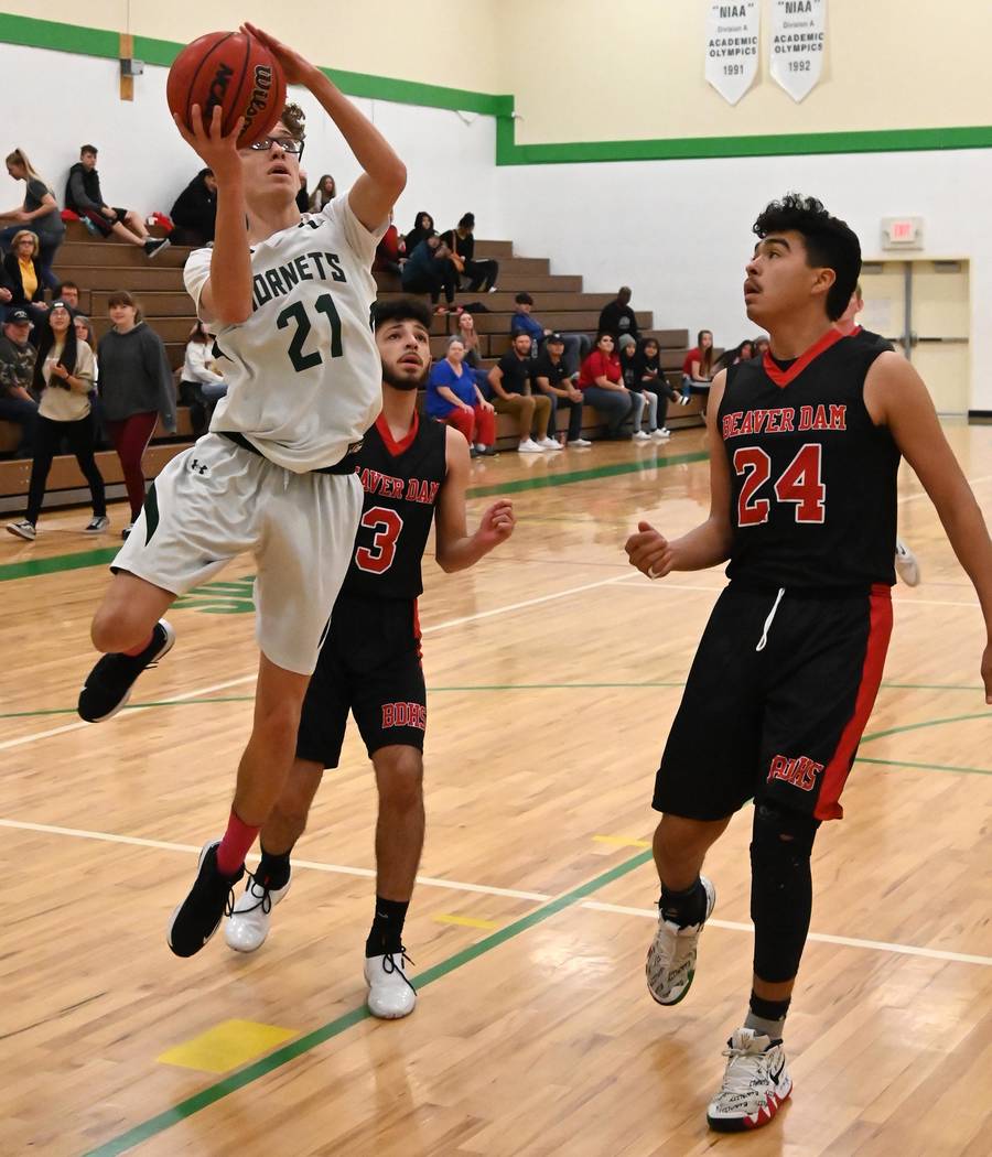Richard Stephens/Special to the Pahrump Valley Times Beatty senior Jorge Leon drives to the bas ...
