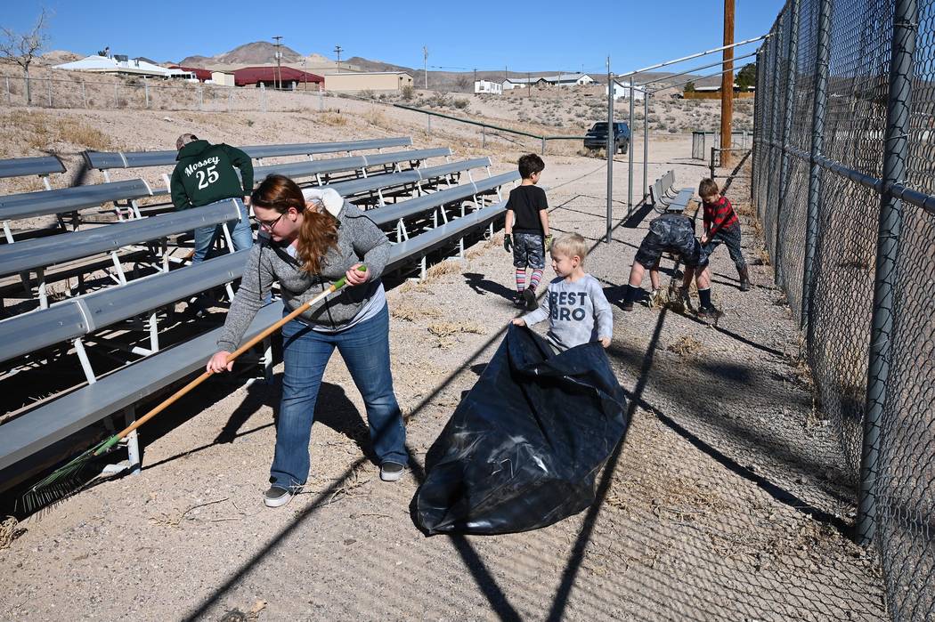Richard Stephens/Special to the Pahrump Valley Times Volunteers help to clean up the area at Co ...