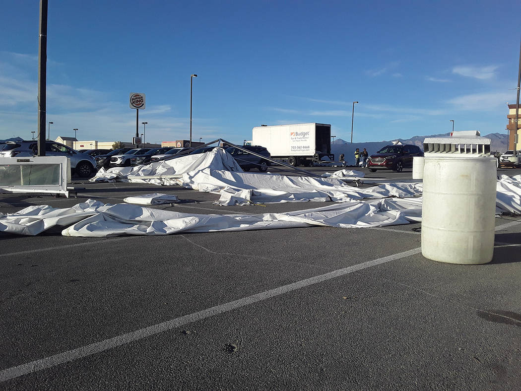 Selwyn Harris/Pahrump Valley Times A Local car dealership's Tent Sale in the parking lot of the ...