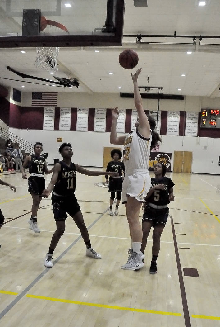 Horace Langford Jr./Pahrump Valley Times Junior Kate Daffer goes up for 2 of her game-high 24 p ...