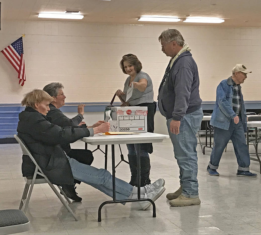 Robin Hebrock/Pahrump Valley Times Nye County Democratic voters are shown placing their paper p ...
