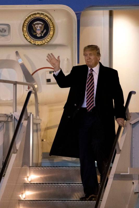 President Donald Trump arrives on Air Force One to McCarran International Airport on Tuesday, F ...