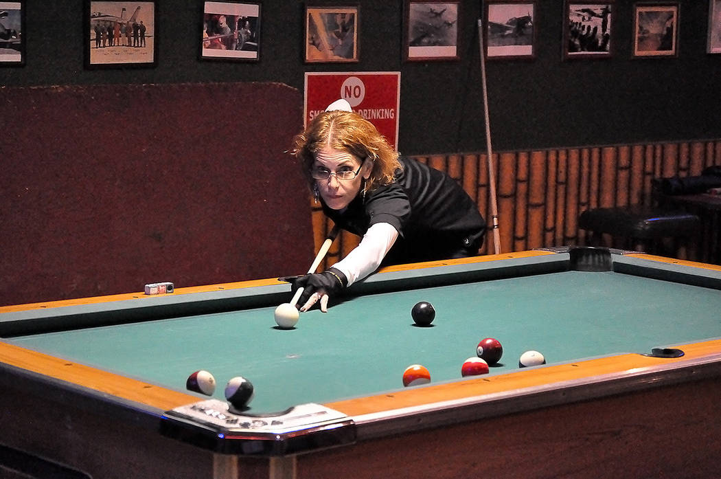 Horace Langford Jr./Pahrump Valley Times Rachelle Ryba lines up a shot during a home pool game ...