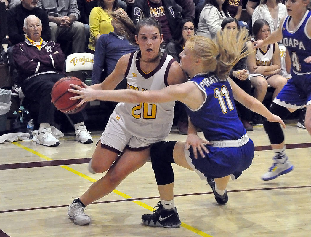 Horace Langford Jr./Pahrump Valley Times Junior Maddy Souza drives the baseline against Moapa V ...