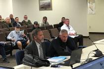 Robin Hebrock/Pahrump Valley Times Attorney Tom Gibson, left, and commercial kennel operator Va ...