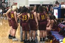 Tom Rysinski/Pahrump Valley Times Pahrump Valley High School girls basketball players gather ar ...