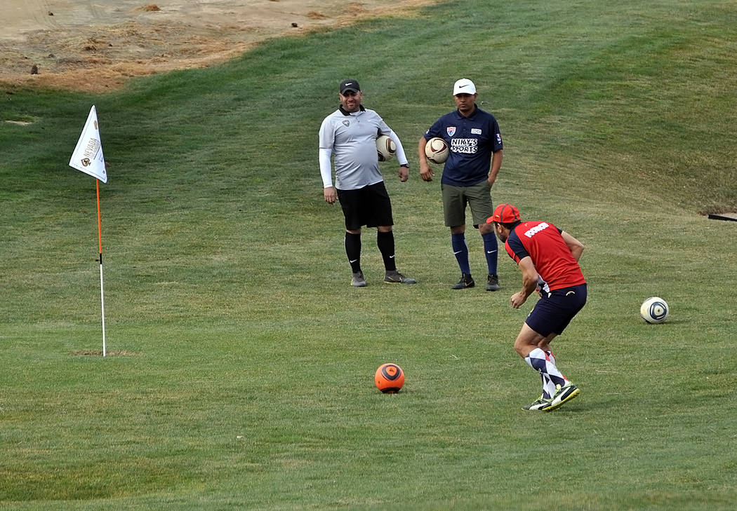Horace Langford Jr./Pahrump Valley Times Footgolfers wait for one of their group to putt during ...