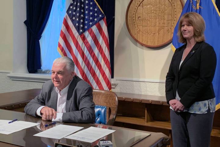 Gov. Steve Sisolak speaks Friday after signing an order creating an advisory panel to draft leg ...