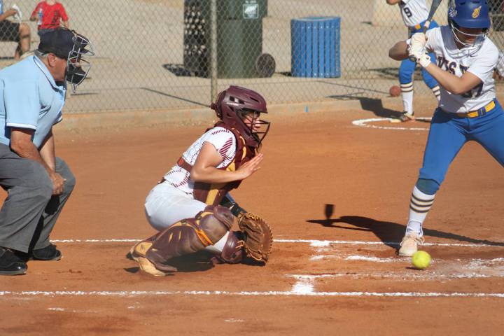 Cassondra Lauver/Special to the Pahrump Valley Times Senior catcher McKayla Bartley goes low to ...