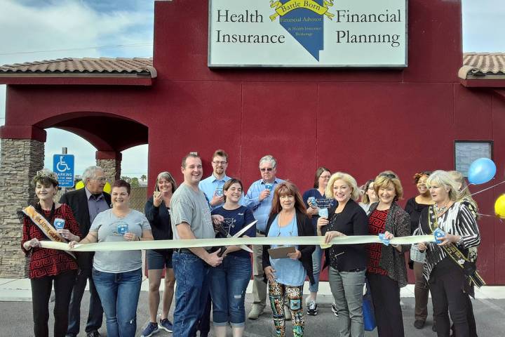 Selwyn Harris/Pahrump Valley Times Certified Financial Planner Brent Leavitt, with giant scisso ...