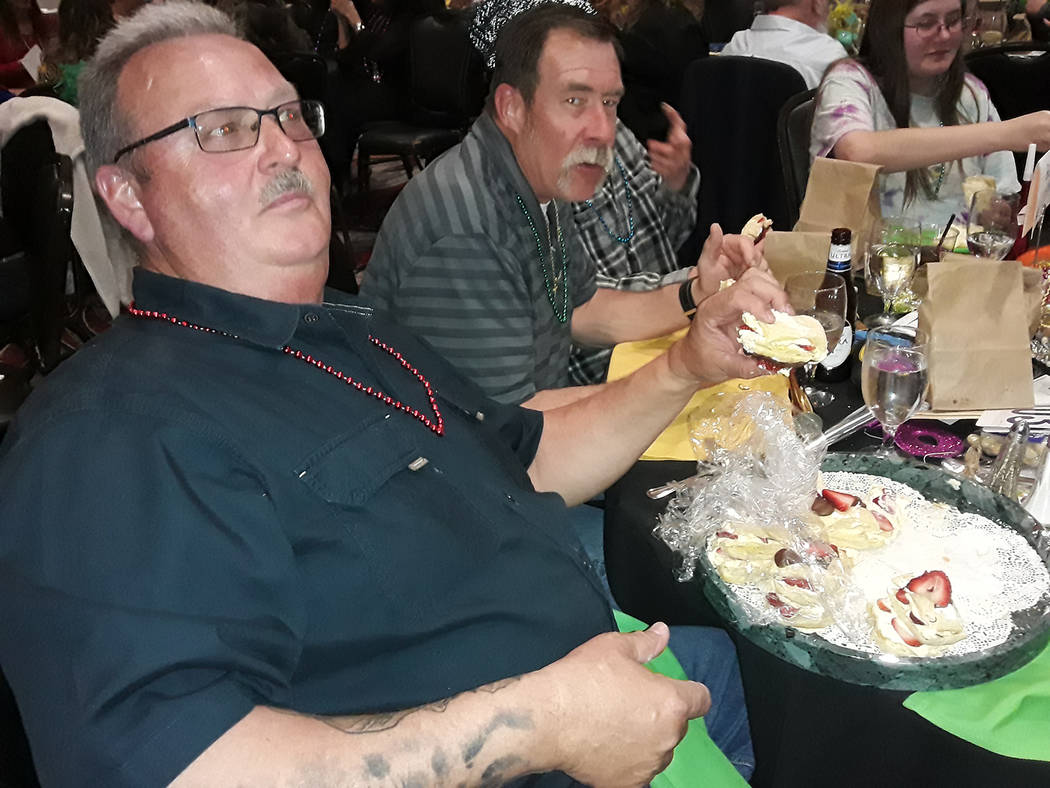 Selwyn Harris/Pahrump Valley Times Mardi Gras Ball attendees were served up a Cajun-style buffe ...