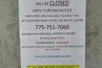 Selwyn Harris/Pahrump Valley Times A sign posted at the Nye County Assessor's Office on Monday, ...