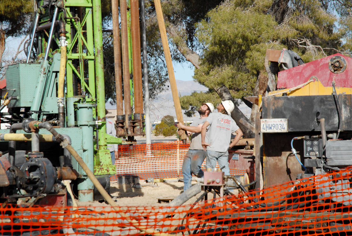 Horace Langford Jr. / Pahrump Valley Times - A 2014 photo showing a well-drilling crew work on ...