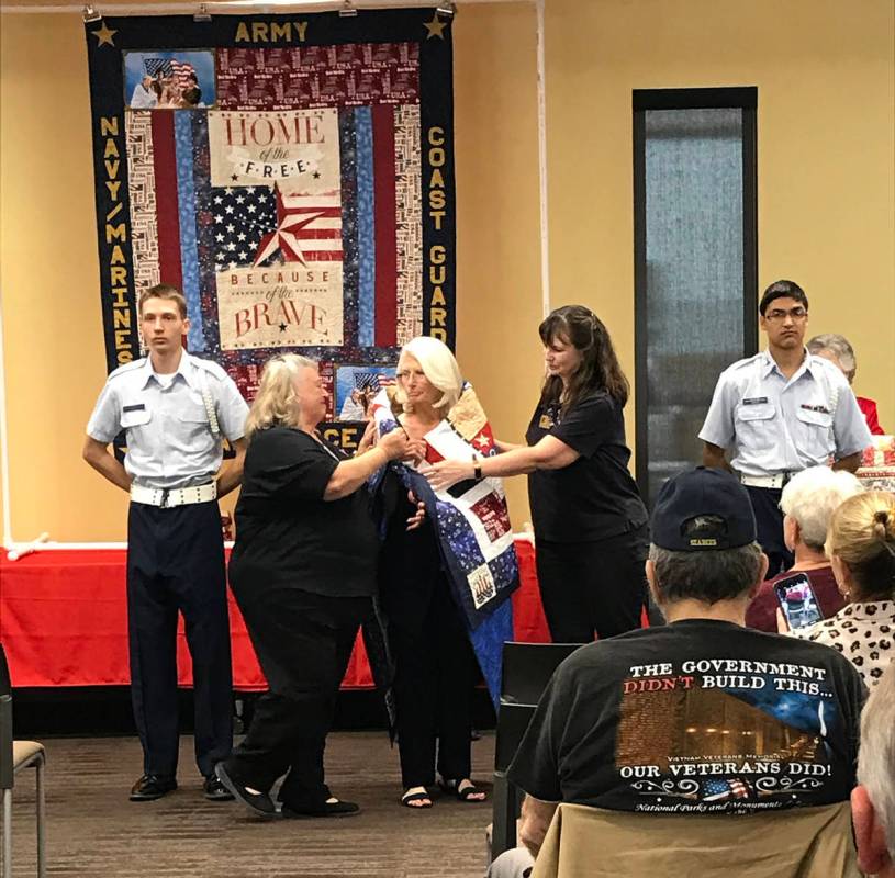 Robin Hebrock/Pahrump Valley Times The Nye County Valor Quilters were able to honor one of thei ...
