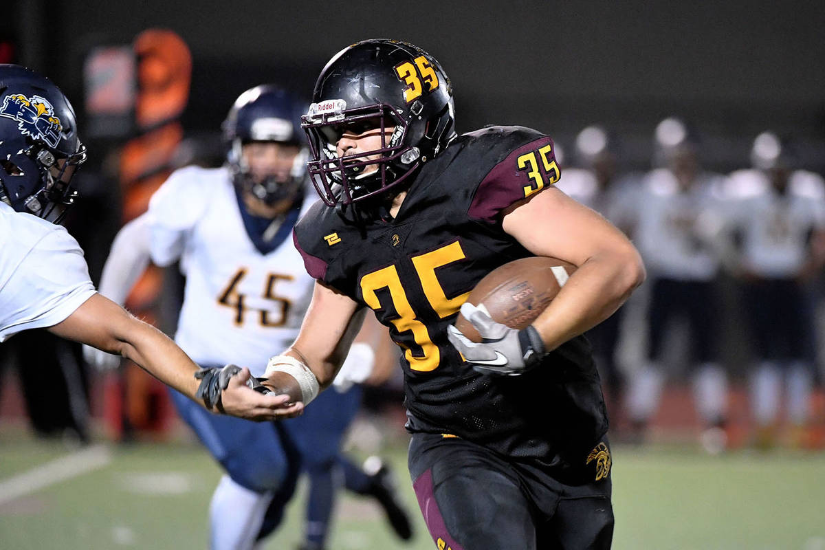 Pahrump Valley Times file photo Nico Velazquez carries for some of his 180 yards rushing during ...