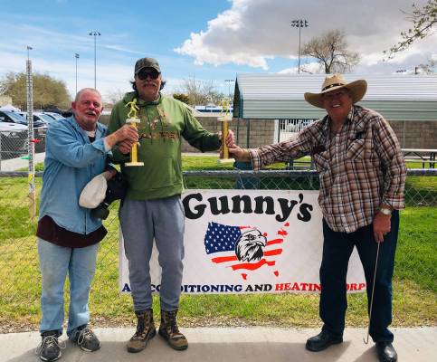 Cindy Barefield/Special to the Pahrump Valley Times Lathan Dilger, center, presents first-place ...