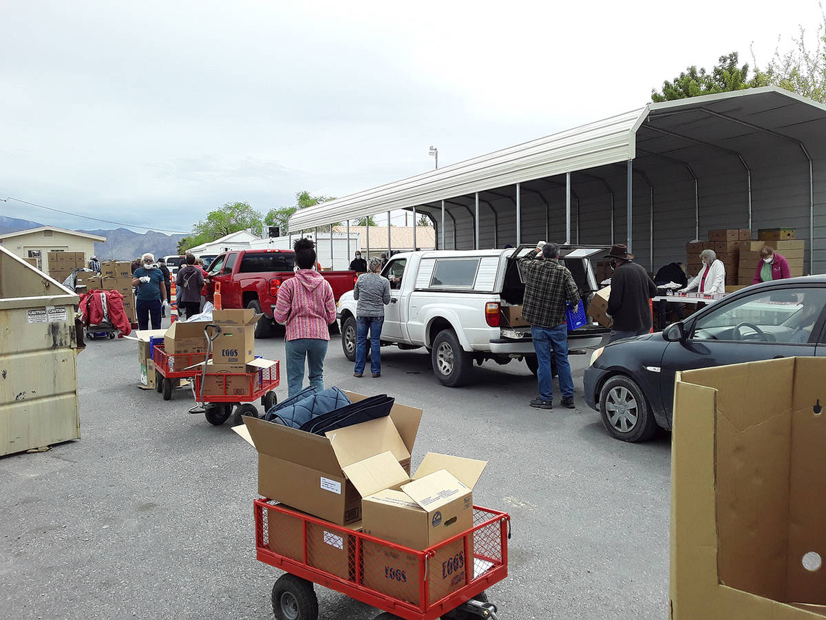 Selwyn Harris/Pahrump Valley Times More than a dozen individuals volunteered their time to help ...