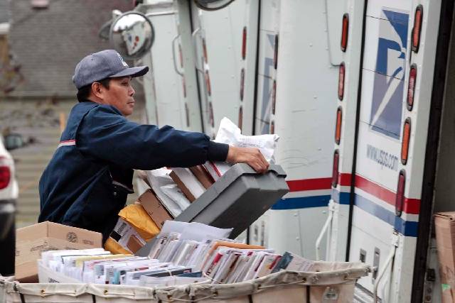 Las Vegas Review-Journal file If a delivery requires a signature, mail carriers will knock on ...