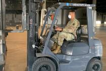 Sgt. Ryan Getsie/Nevada Army Guard Soldiers with the 1-221 Cavalry process shipments of medica ...