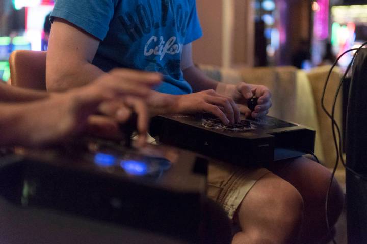 Jason Ogulnik/Special to the Pahrump Valley Times Quick hands compete in the Street Fighter V t ...