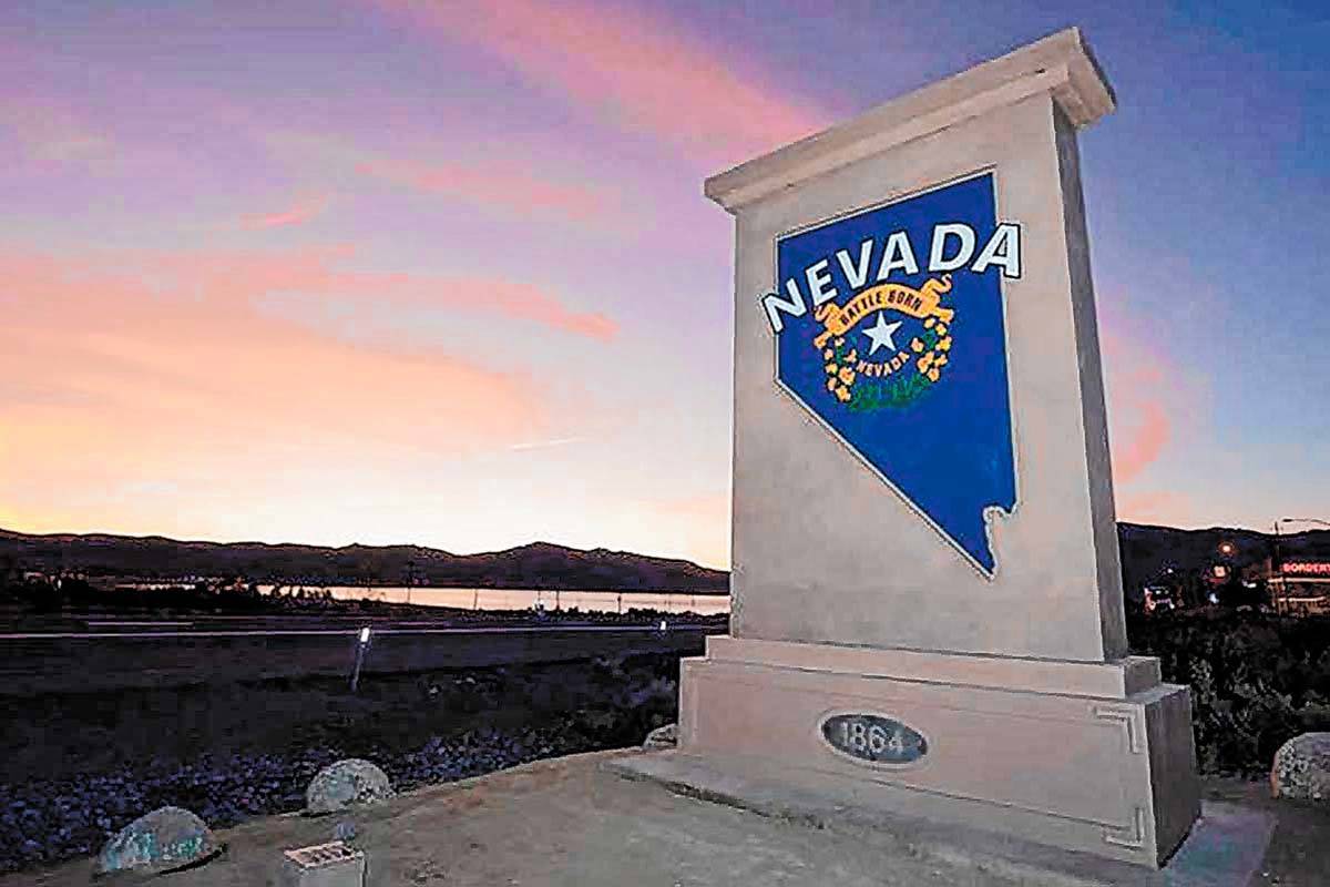 A "Welcome to Nevada" monument sign similar to the one shown along U.S. Highway 395 a ...