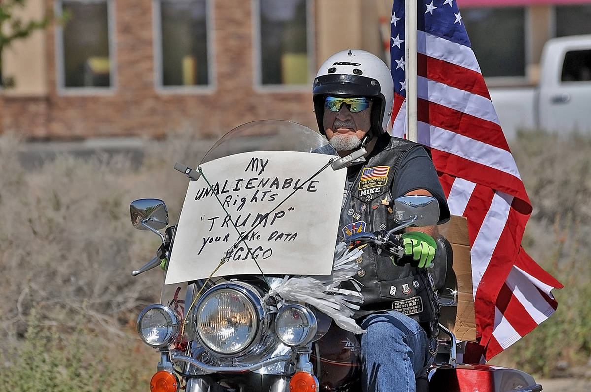 Horace Langford Jr./Pahrump Valley Times A local protester on his Harley showed his support fo ...
