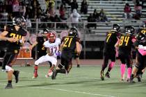 Peter Davis/Pahrump Valley Times file Tony Margiotta scampers for some of his 96 yards during l ...