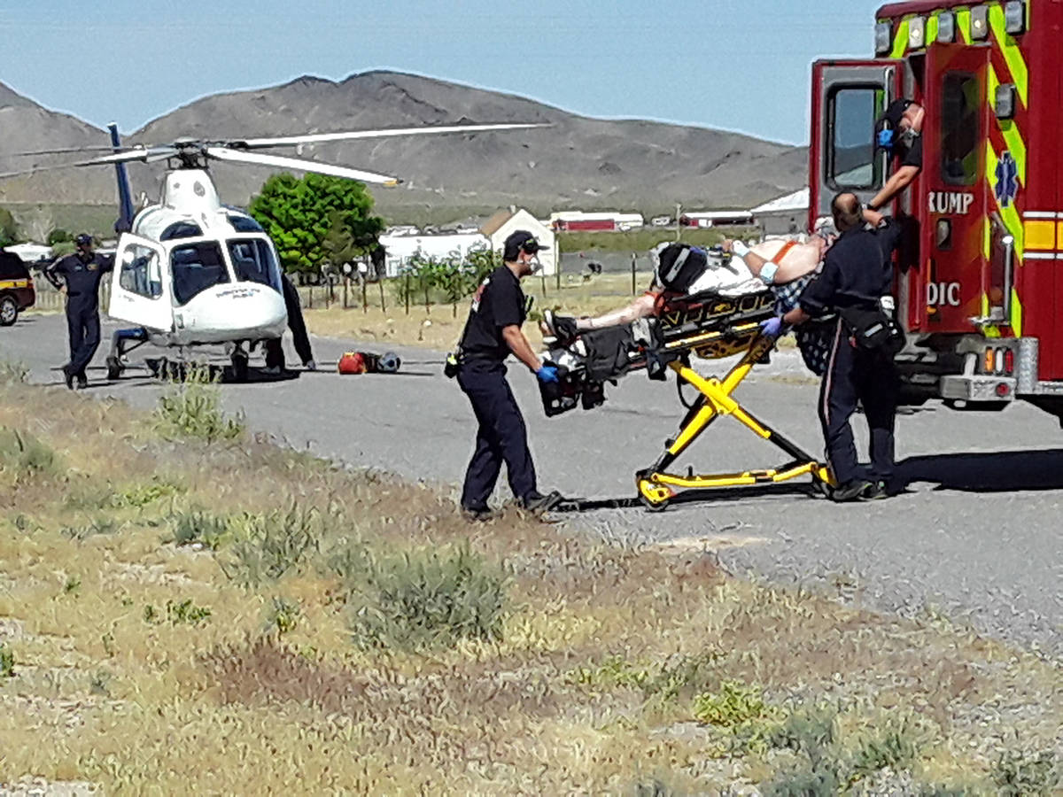 Selwyn Harris/Pahrump Valley Times Pahrump Valley Fire and Rescue Services medics prepare to tr ...