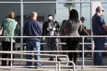 Bizuayehu Tesfaye/Las Vegas Review-Journal People wait in line at One-Stop Career Center on Mon ...