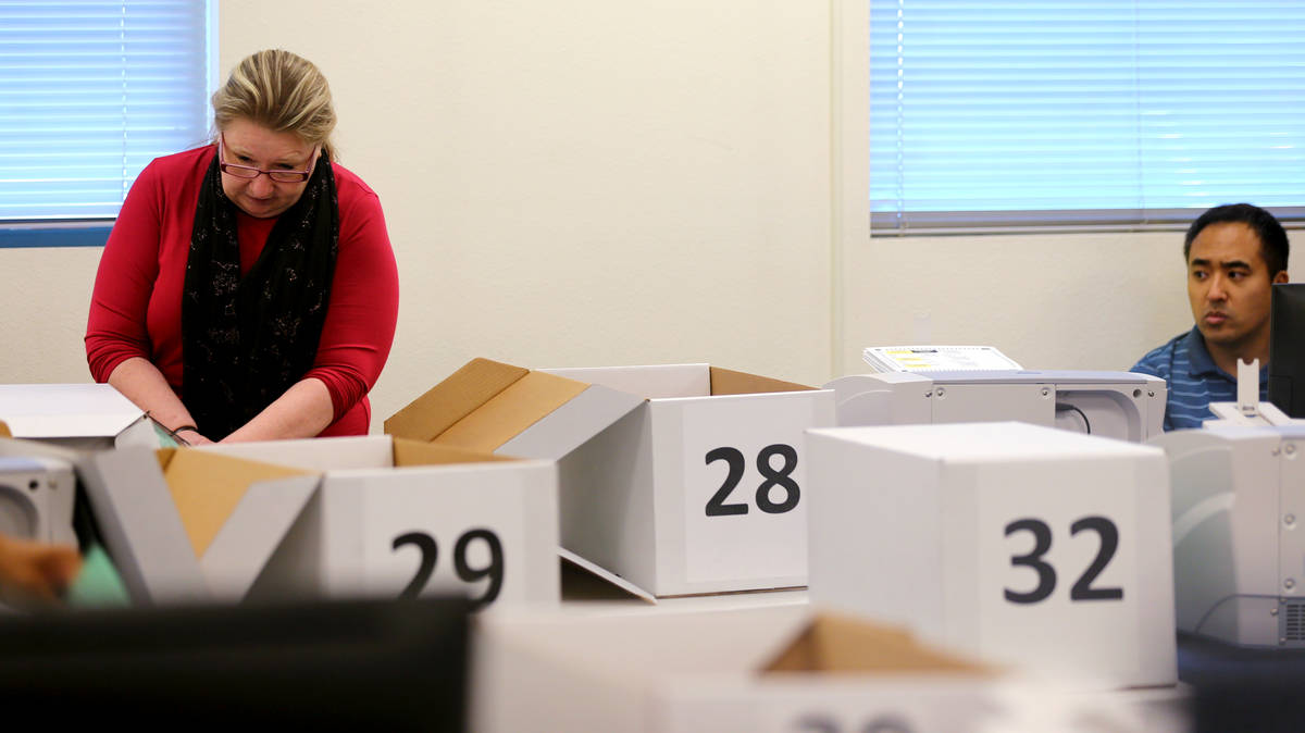 K.M. Cannon Las Vegas Review-Journal Clark County election workers count mail-in ballots durin ...