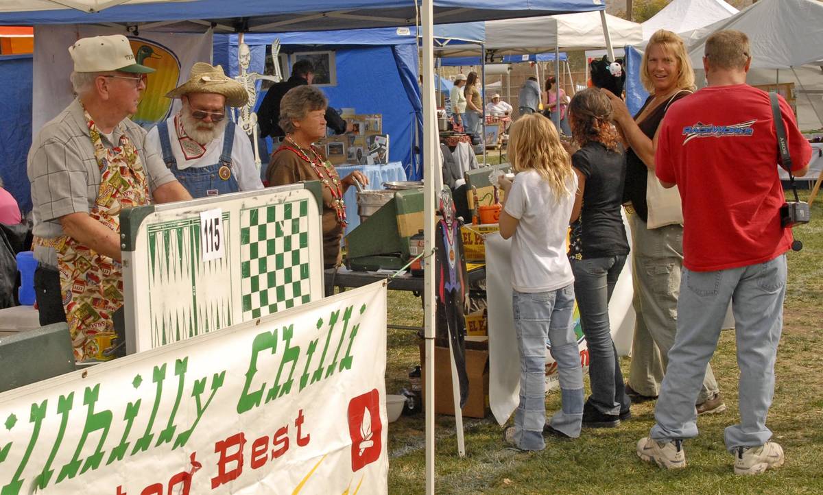 Richard Stephens/Special to the Pahrump Valley Times Festivalgoers enjoy the chili cook-off at ...
