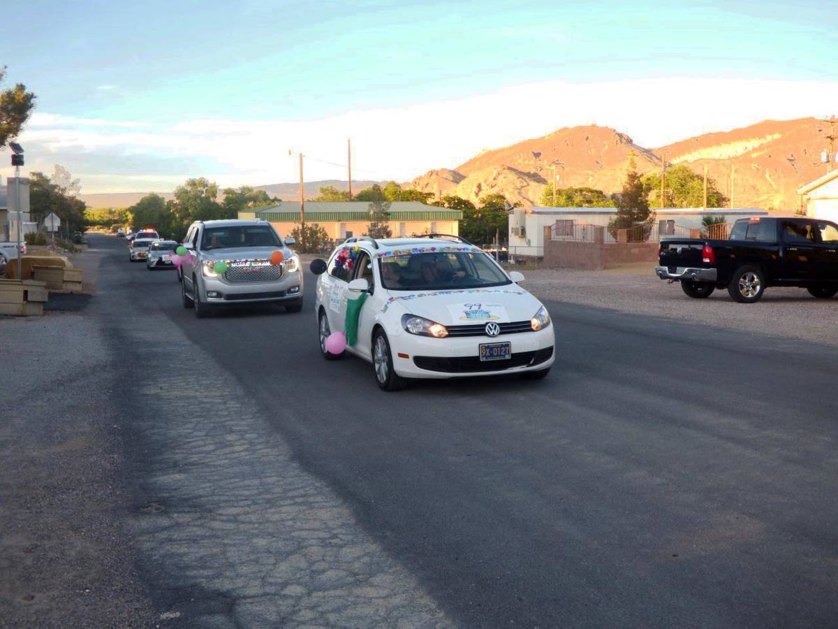 Special to the Pahrump Valley Times Two Nye County Sheriff's deputies led a parade of vehicles ...