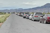 Selwyn Harris/Pahrump Valley Times Vehicles lined up from Raindance Drive off of Highway 372, f ...