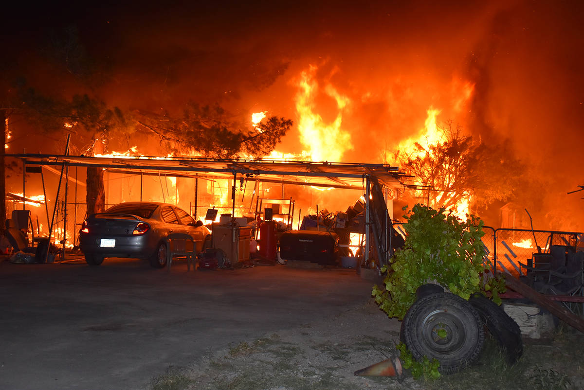 Special to the Pahrump Valley Times Pahrump fire crews battled a fierce multi-structure fire al ...